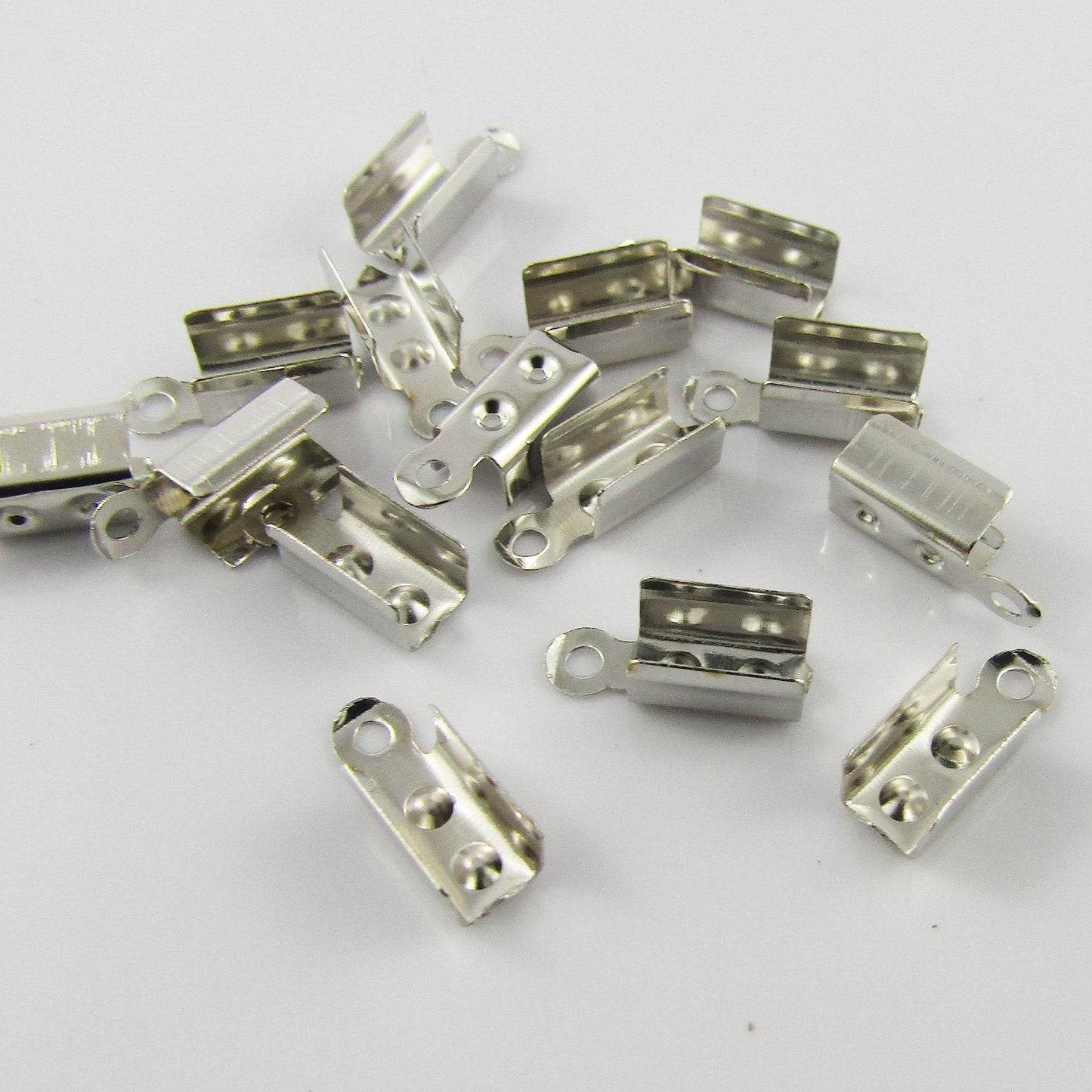 25 Sets (50pcs) Iron Fold Over Cord Crimp Ends 12x4.5mm Hole 1.4mm Silver Tone