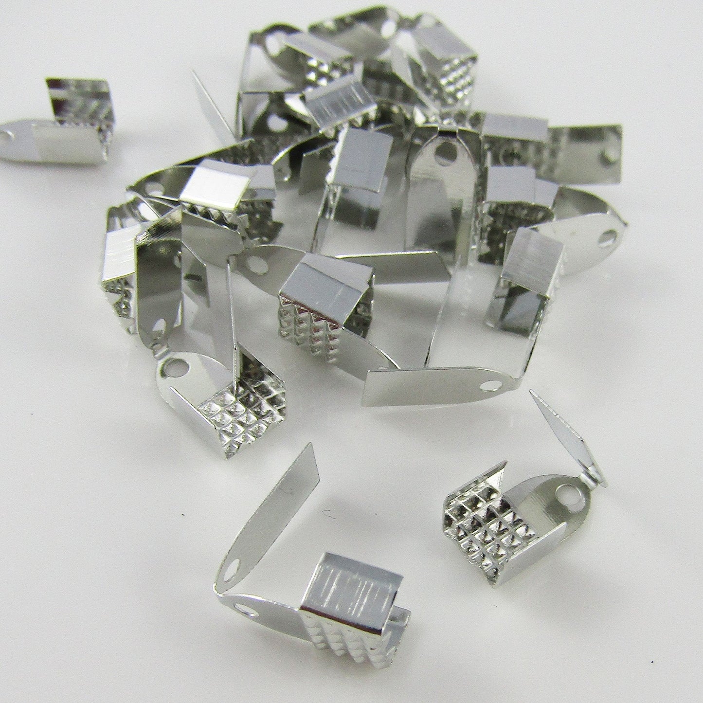 50pcs (25 Sets) Iron Fold Over Cord Crimp Ends 11x6x5mm Hole 1.5mm Silver Tone