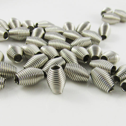 50g 95+pcs Spring Coil Spacer Beads Craft etc 9x6mm Hole 2mm Silver Tone