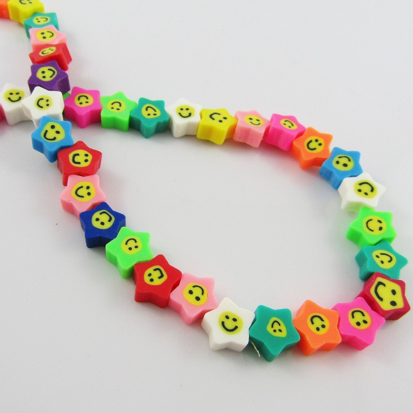 1 strand Approx 38pcs Polymer Clay Star Smiley Face Bead 7-9x9-11x4mm Hole 1.5mm